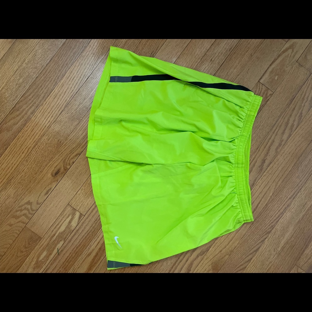 Men’s Nike running shorts. Barely worn. Look new. Zipper pouch on back.